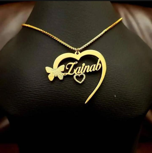 Gold necklace with a heart-shaped pendant and butterfly by ziva style